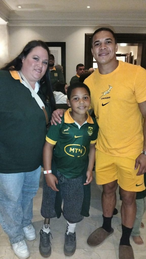 Eight-year-old rugby fan Oluthando Nkosinkulu meets Springbok star Cheslin Kolbe.