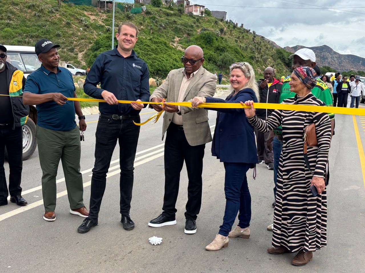 MEC Xolile Nqatha and officials cut the ribbon to open the rehabilitated Humansdorp–Hankey Road.