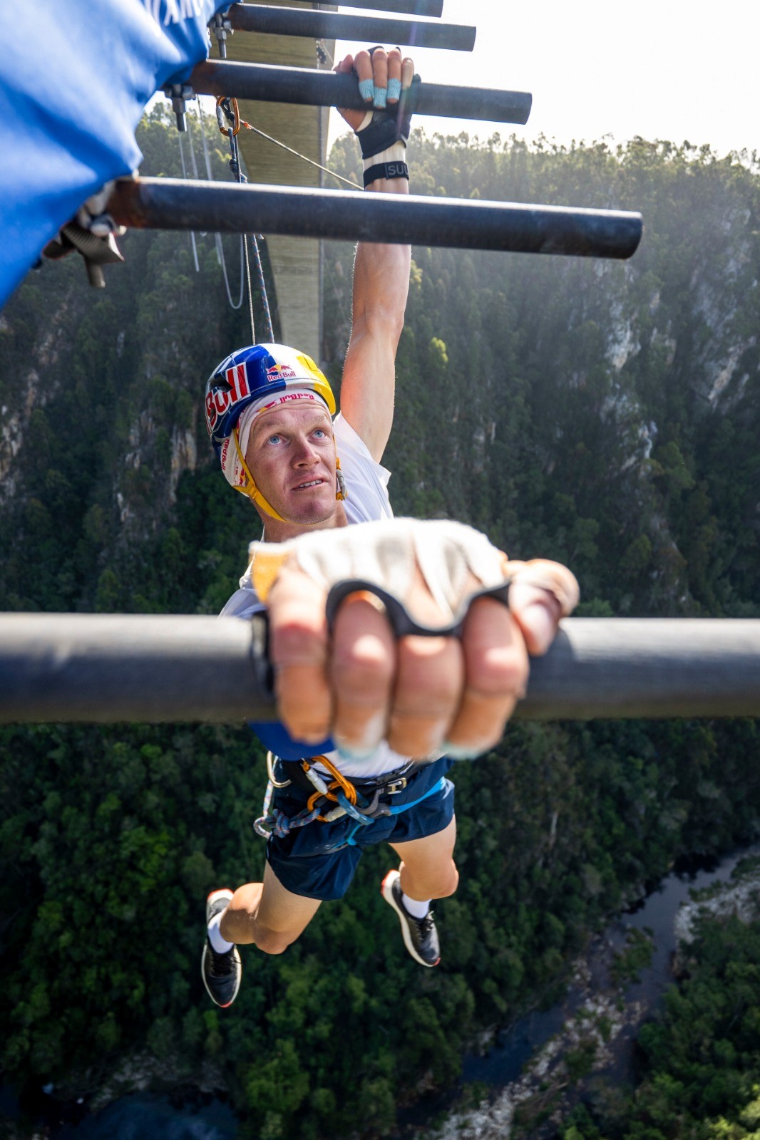 OCR world champion Thomas van Tonder battles the 45-degree climb beneath the Bloukrans Bridge arch.