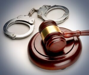 Rape suspect arrested, unlicensed firearm seized