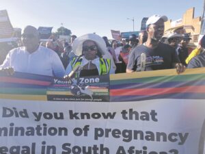 Government officials lead march against illegal abortions