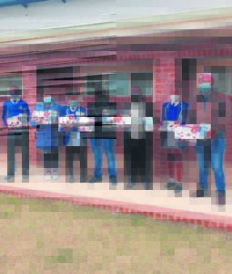 NPO gifts school with study guides and calculators