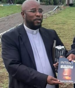 Local priest publishes book that offers healing to those in need