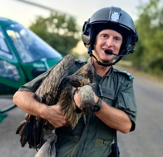 One of the pilots with a rescued vulture