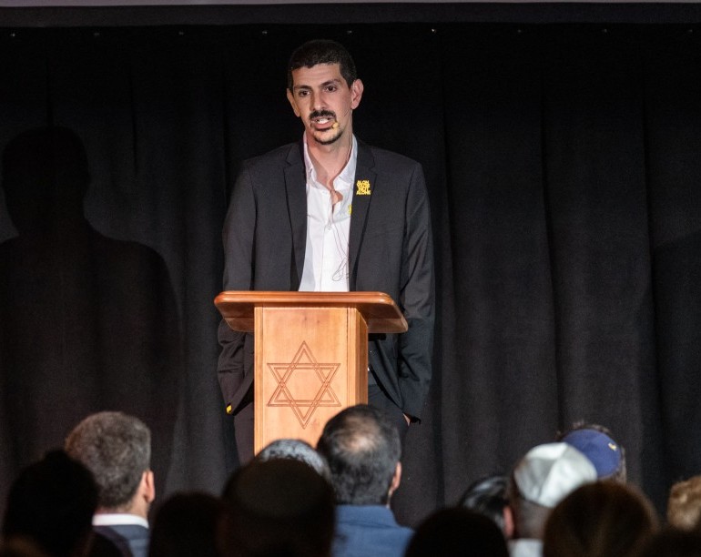 Freed Israeli hostage Or Levy (C) shares his experience with an audience during an event organised by the Jewish National Fund South Africa (JNFSA) in partnership with The Base Community in Glenhazel, near Johannesburg, on August 31, 2025. Or Levy was held hostage in the Gaza Strip for 491 days after Hamas's October 7 attack where his wife was killed. Hamas's October 2023 attack on Israel resulted in the deaths of 1,219 people, mostly civilians, according to an AFP tally based on Israeli figures. Israel's retaliatory offensive has killed at least 63,557 Palestinians, most of them civilians, according to figures from the health ministry in Hamas-run Gaza that the United Nations considers reliable. (Photo by EMMANUEL CROSET / AFP)