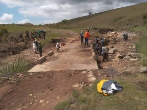 Mqanduli men build bridge using own funds