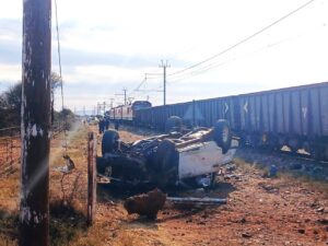 Four killed in collision between train and bakkie