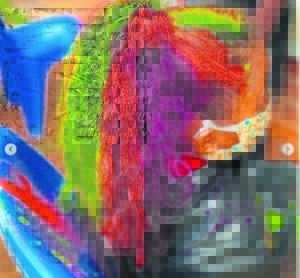 Locks shaved, sprayed in support of cancer patients