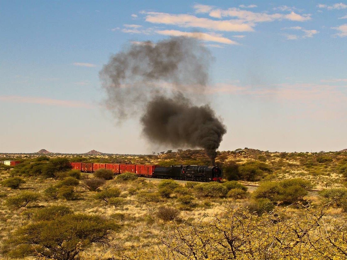 steam locomotive over a bridge
