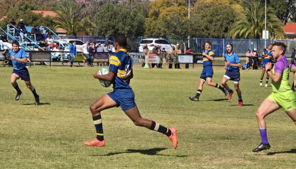 rugbyspeler op die baan