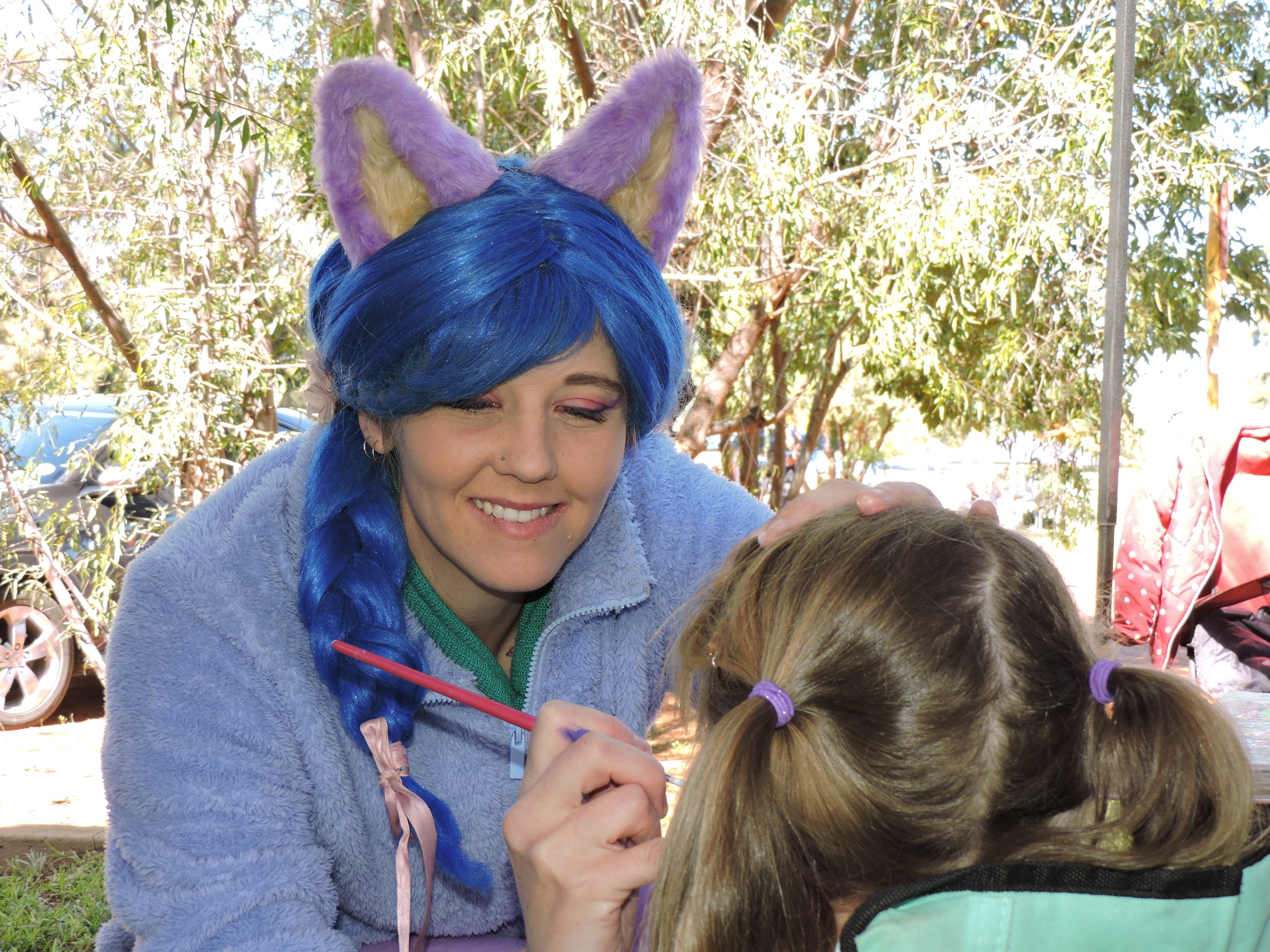 Kuns van gesigverf bring glimlagte vir kinders, ouers op spesiale dae