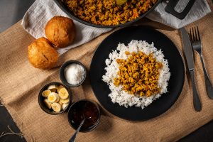 Savory flavoured pork mince: A must-try curry dish served with vetkoek or rice