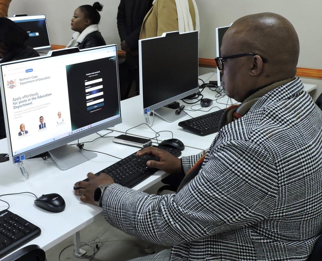 Emmanuel Moleele of the Northern Cape Department of Education's head office testing out the e-recruitment system during its launch on 6 August.  