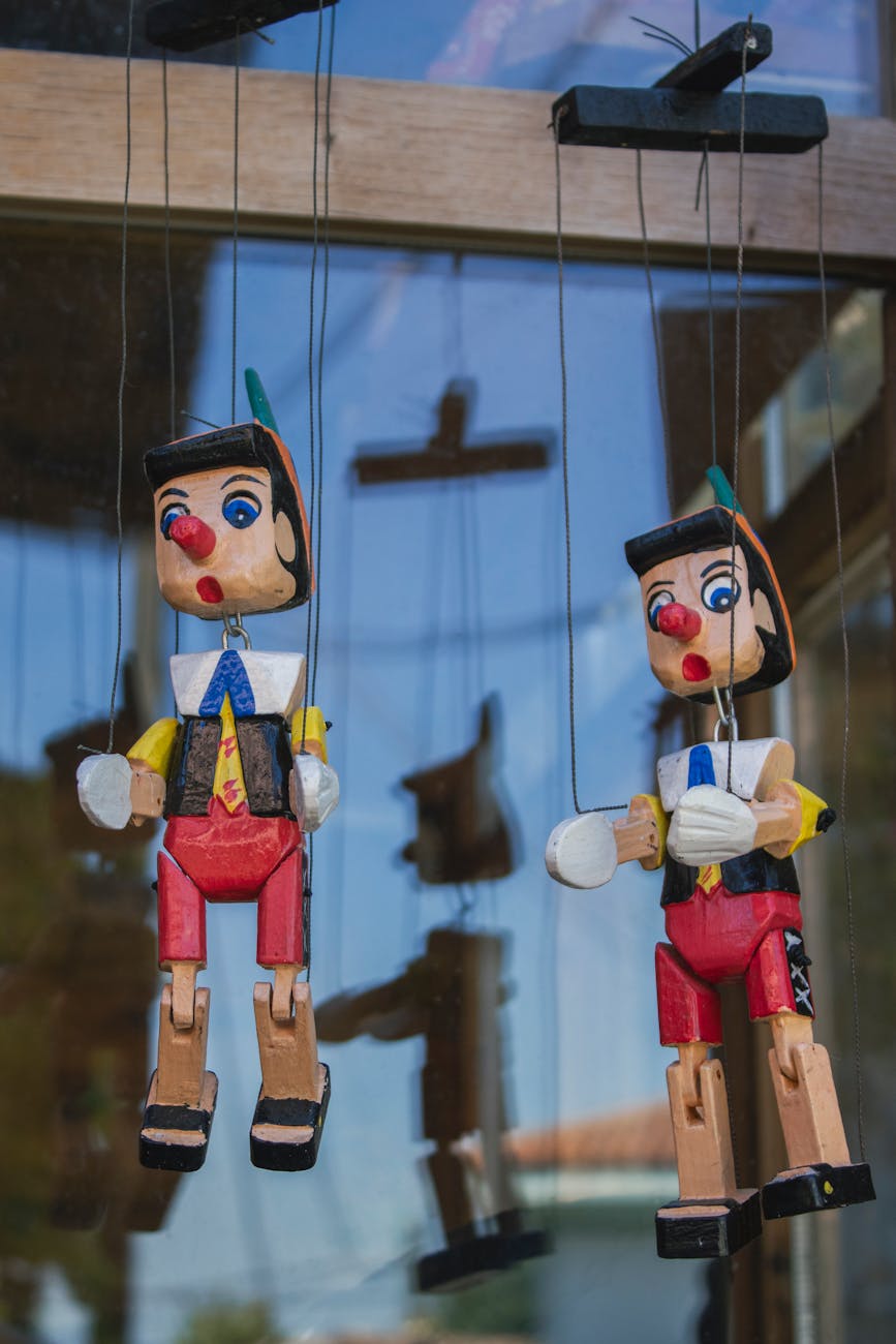 colorful pinocchio puppets in turkish window