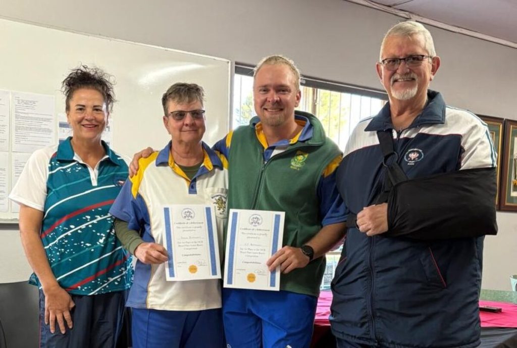 At the prize-giving event following the Northern Cape Bowls Mixed Pairs Championships are from the left René van Niekerk (competition secretary), Annelie and CP Mathewson (mother-and-son duo, winners) and Braam van der Westhuizen (president Northern Cape Bowls).