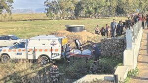 Woman’s body found in trench