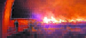 Ligte reën ’n seën ná brand onder beheer gebring is