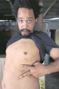 Slagoffers sien rooi oor skote na Rooiland-onluste