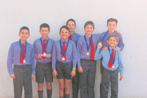 Courtrai se o.11-seuns wen brons by tennistoernooi