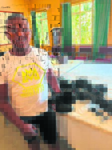 Councillor hands school shoes to the needy