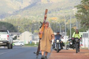 Bearing the cross to spread the word of God