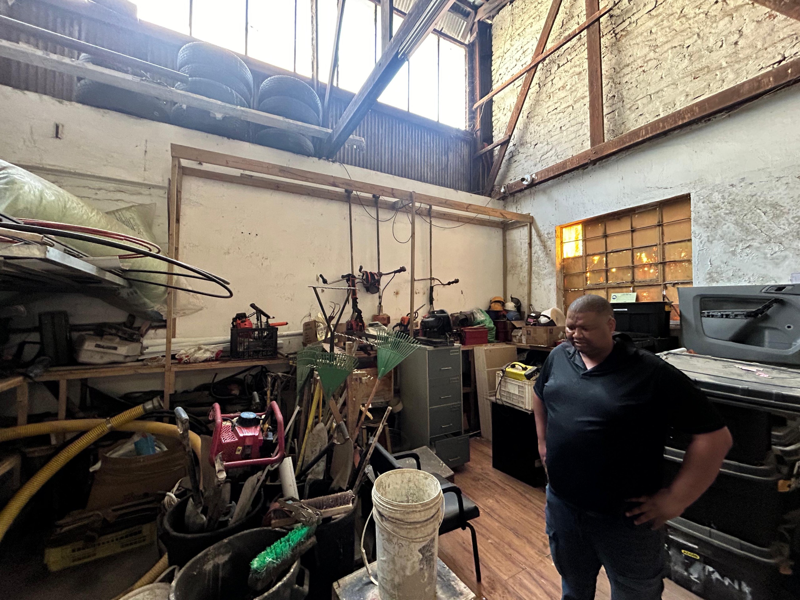 Jeremy Arries staan in Silver Solutions se stoorkamer waaruit die meeste van die goedere gesteel is. Foto: Rasaad Adams