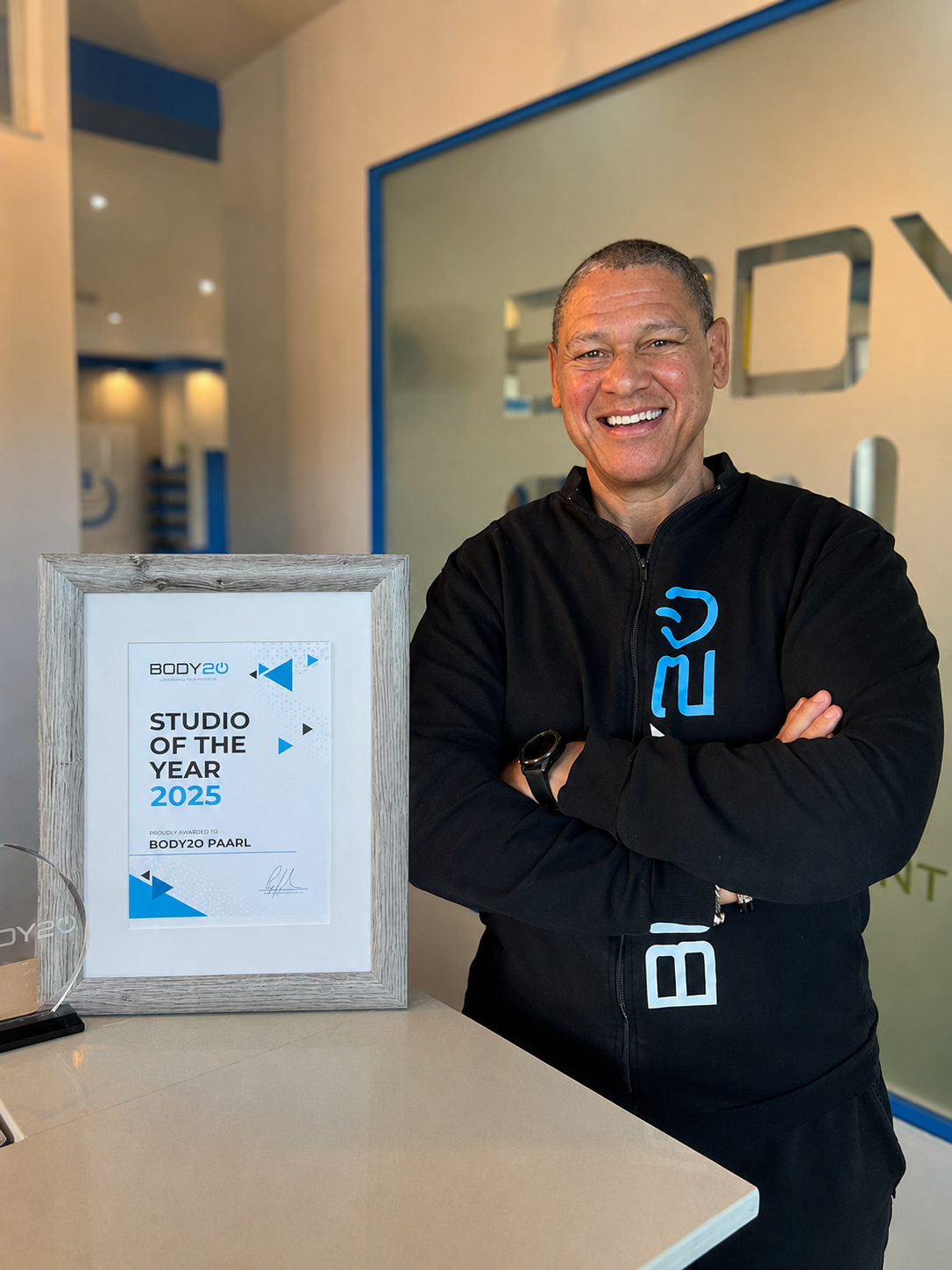 Ron Samuels, owner of Body20 in Paarl and Hermanus, with his recognition certificate.