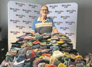 Senior citizen knits 356 beanies for charity