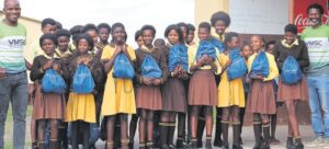 Schoolgirls receive sanitary pads