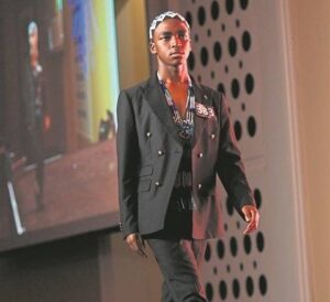 Young model needs help getting to New York