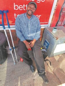 Struggling local car guard in urgent need of leg brace