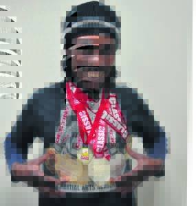 Martial arts star wins gold