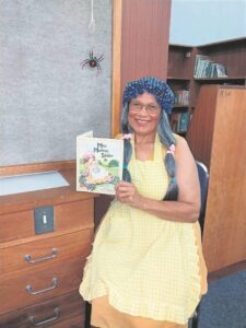 Miss Muffet visits learners for World Read Aloud Day