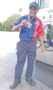 Petrol attendant overcomes challenges to become IRONMAN