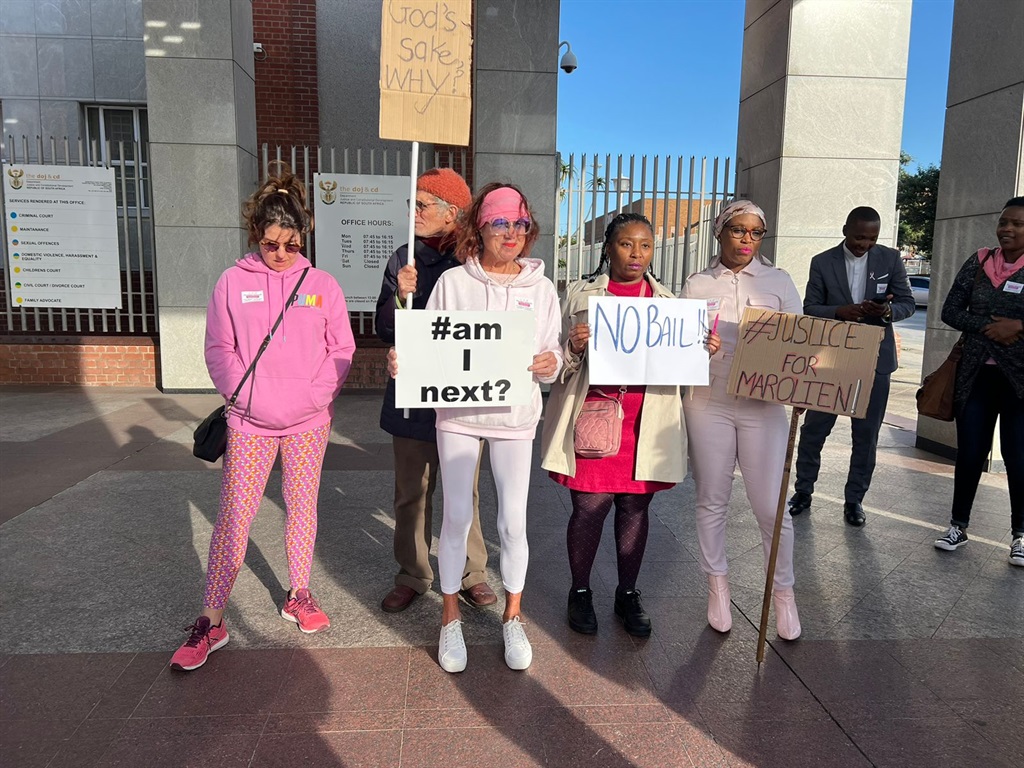 Friends dressed in pink in solidarity with Marolie