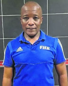 Retired FIFA match official continues to serve football