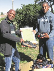 Ward councillor buys boots to help soccer club