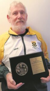 Ludik receives award for commitment to powerlifting