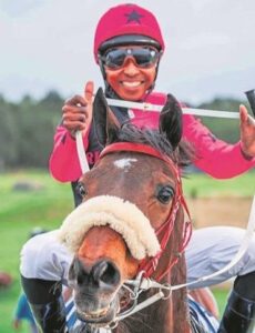 IN THE SADDLE: Jockeys, trainers engage in title fight