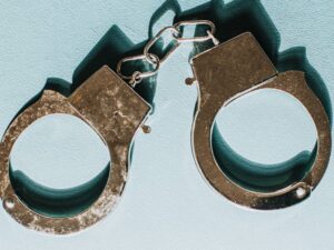 Police arrest one of their own who was in possession of illegal firearm, drugs