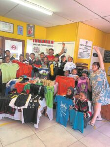 Triathlete donates to Sanctor Primary
