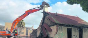 Central residents celebrate demolition of infamous crime den