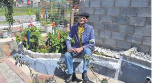 Uncle Dougie shares love of gardening with youth