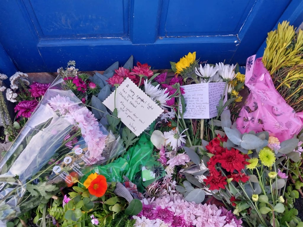 Friends paid tribute with flowers and messages at 