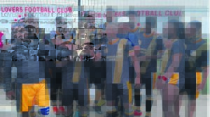 Amachina lift trophy after exciting win