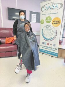 Doctor goes extra mile for patients, shaves head for CANSA