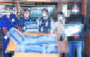 Face shields produced for medical, essential services personnel