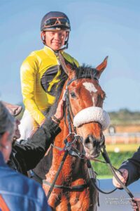 IN THE SADDLE: Racing speeds up at Fairview racetrack