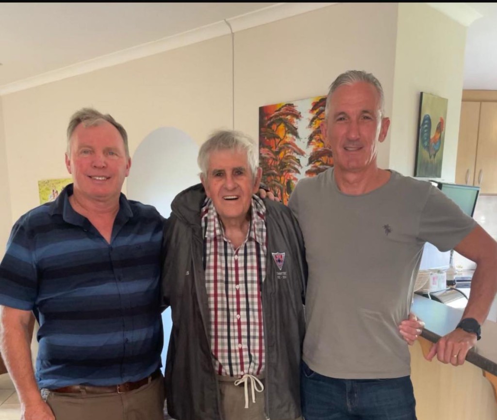 Les Barnes (centre) with Alec Riddle (left) and tri-athlete Mike Bosch (right).