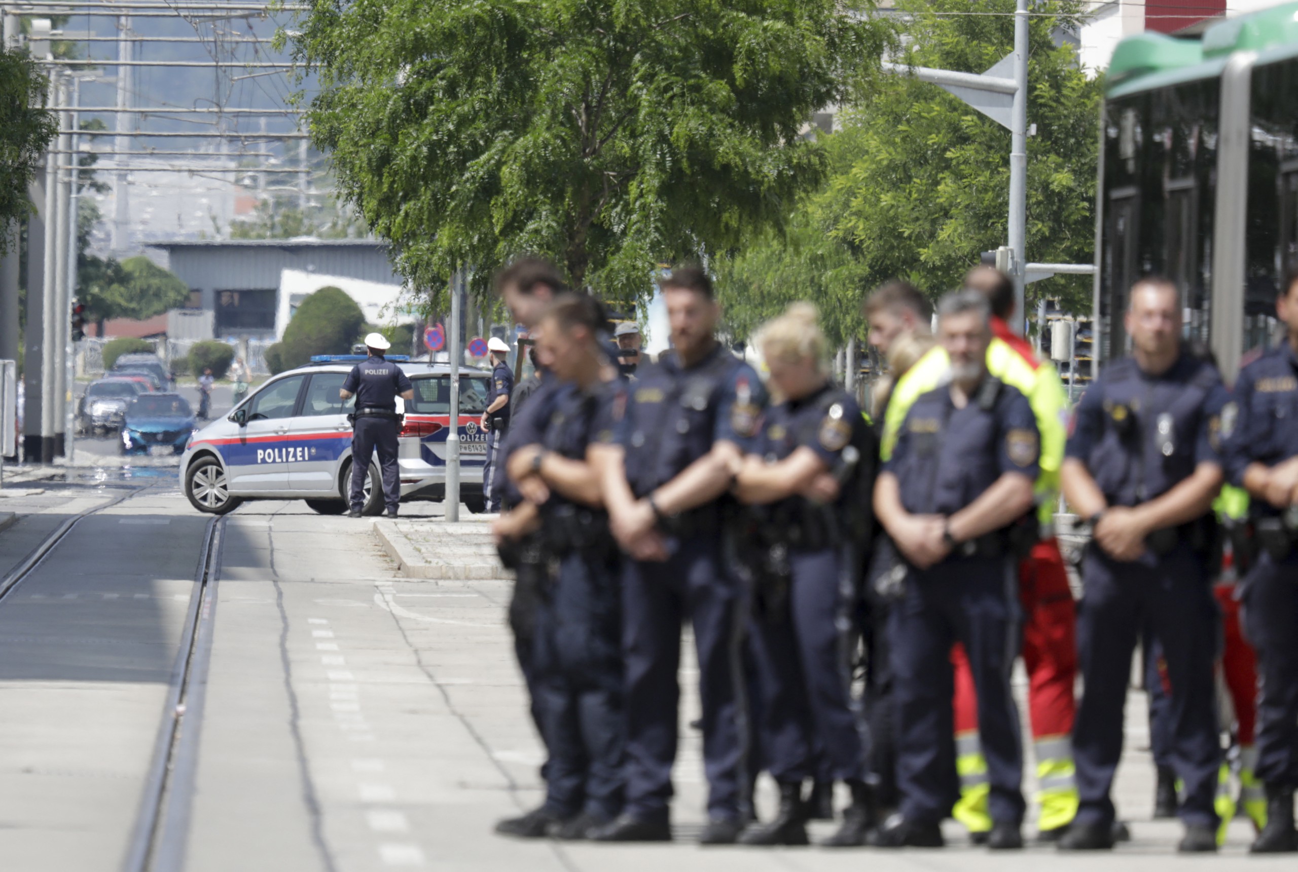 Police block a street near a school where several people died in a shooting in Graz, southeastern Austria. Ten people died after a suspected shooter opened fire in a southeastern Austrian school.
